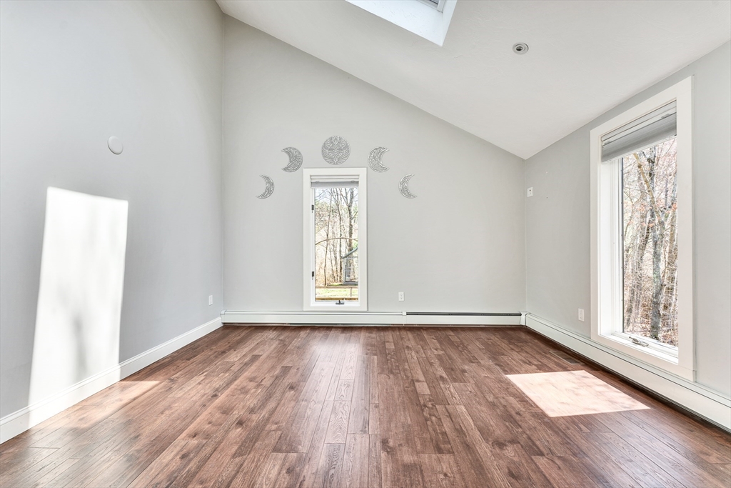 151 Wheeler Street Rehoboth, MA 02769 - Photo 20 of 36 a view of an empty room with wooden floor and a window