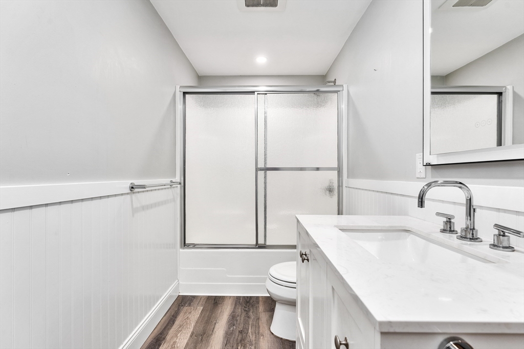 151 Wheeler Street Rehoboth, MA 02769 - Photo 30 of 36 a bathroom with a sink toilet and shower