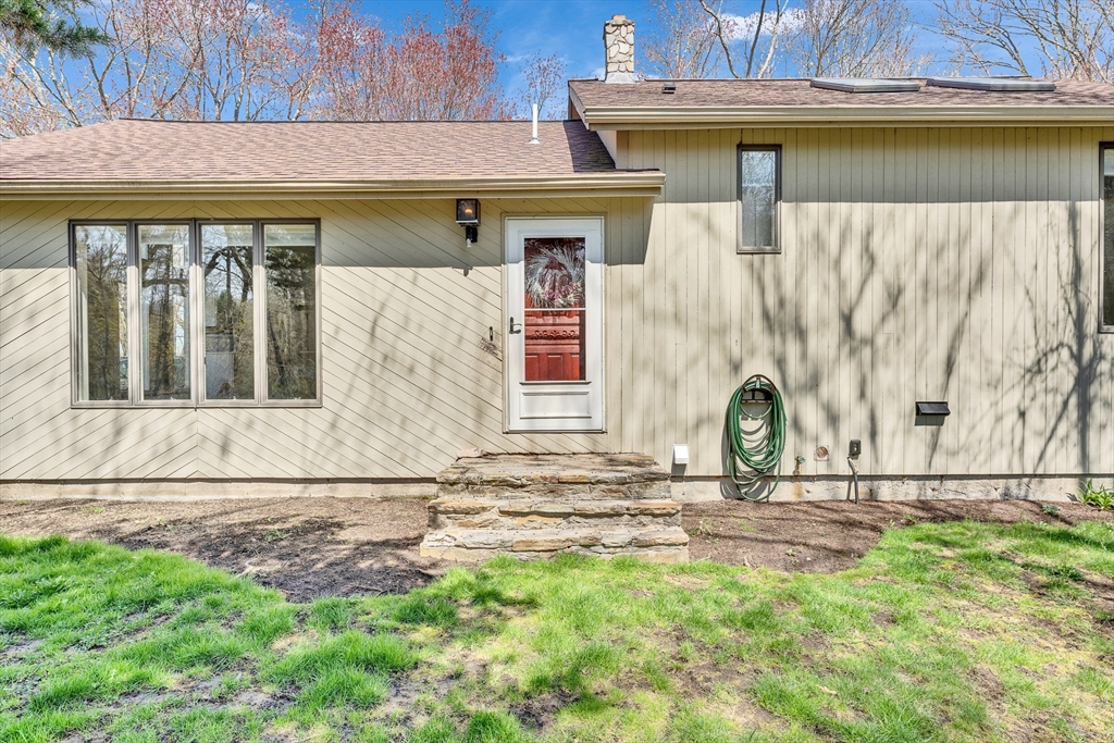 151 Wheeler Street Rehoboth, MA 02769 - Photo 4 of 36 a view of front door of house with yard