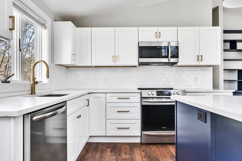 151 Wheeler Street Rehoboth, MA 02769 - Photo 9 of 36 a kitchen with cabinets stainless steel appliances and sink