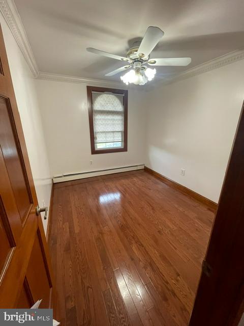 10 Middle Road Levittown, PA 19056 - Photo 8 of 25 a view of an empty room with wooden floor and fan
