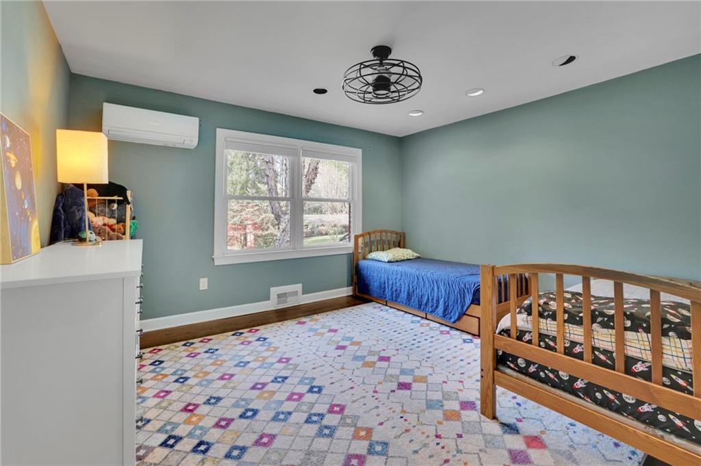 2476 Burnt Leaf Lane Decatur, GA 30033 - Photo 17 of 41 a bedroom with furniture and a window