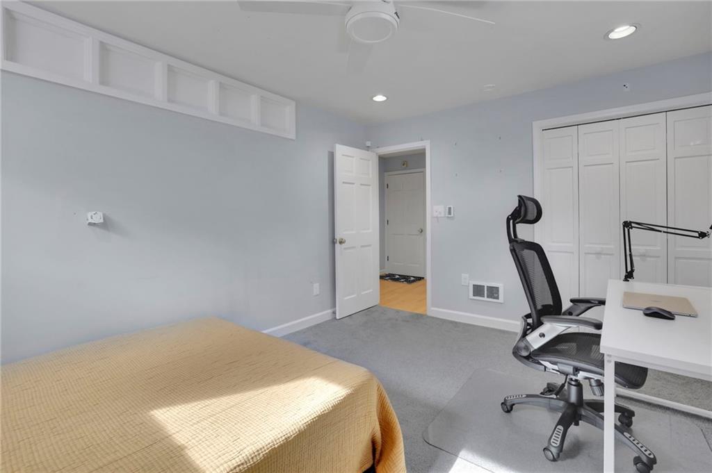 2476 Burnt Leaf Lane Decatur, GA 30033 - Photo 25 of 41 a view of a room with gym equipment