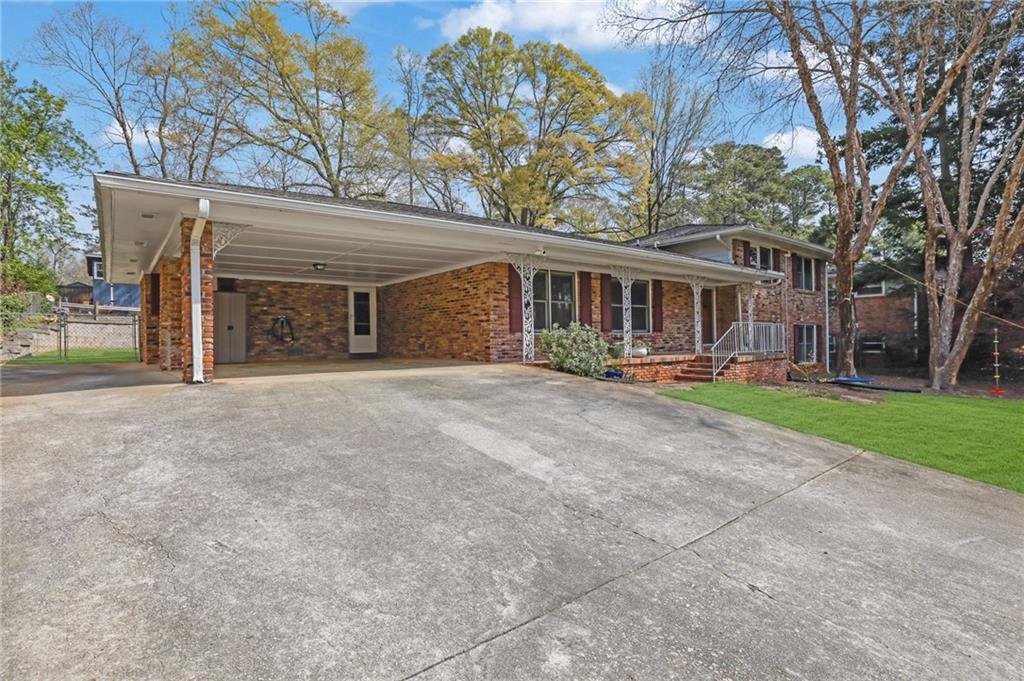 2476 Burnt Leaf Lane Decatur, GA 30033 - Photo 35 of 41 a front view of house with yard and green space