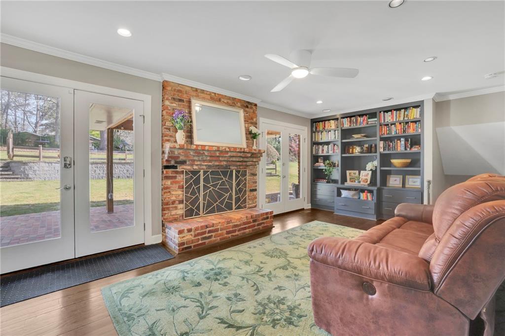 2476 Burnt Leaf Lane Decatur, GA 30033 - Photo 8 of 41 a living room with furniture and a fireplace