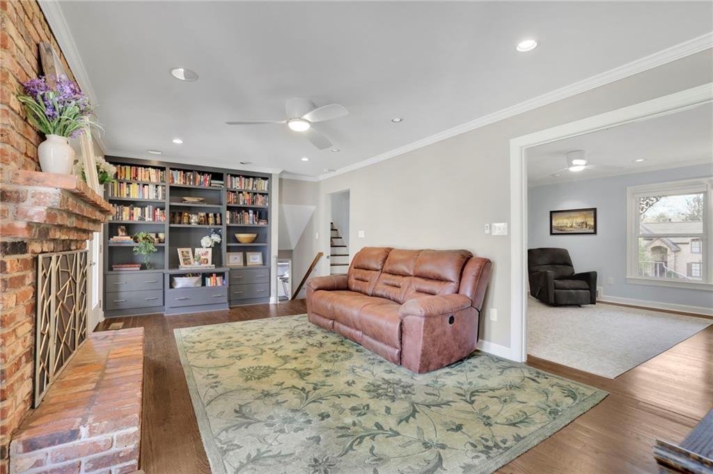 2476 Burnt Leaf Lane Decatur, GA 30033 - Photo 10 of 41 a living room with furniture and a book shelf