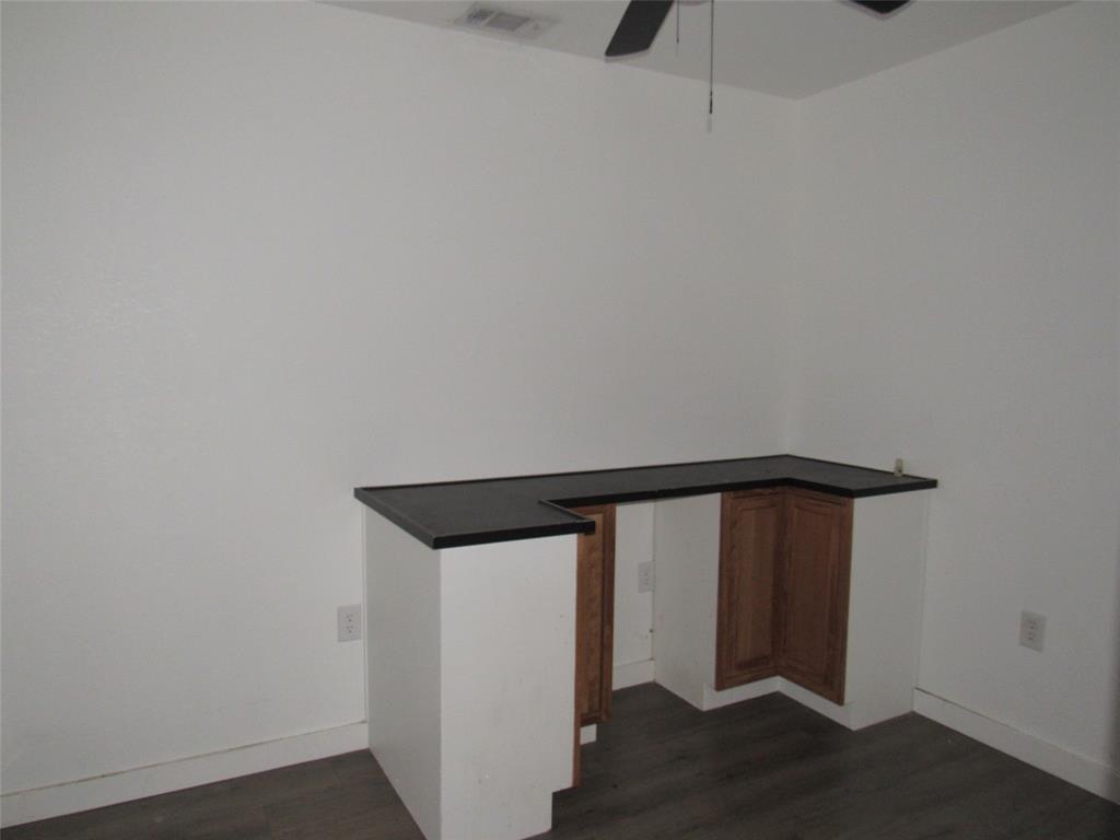 108 Private Road Whitney, TX 76692 - Photo 12 of 14 a view of entryway with wooden floor