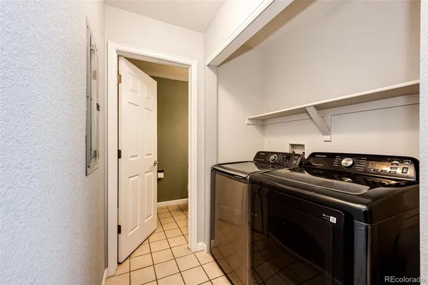 a utility room with washer and dryer