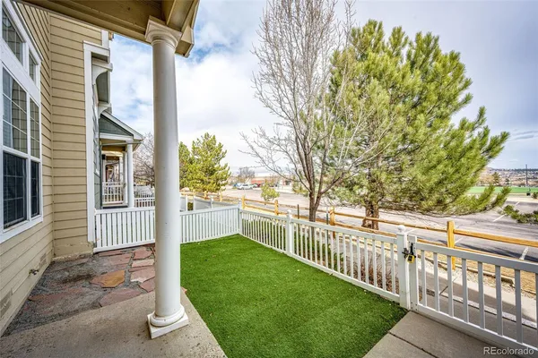 a view of a porch with a backyard