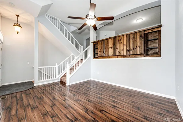 a view of entryway with wooden floor