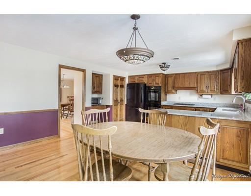 18 Argilla Road Methuen, MA 01844 - Photo 11 of 30 a view of a dining room with furniture