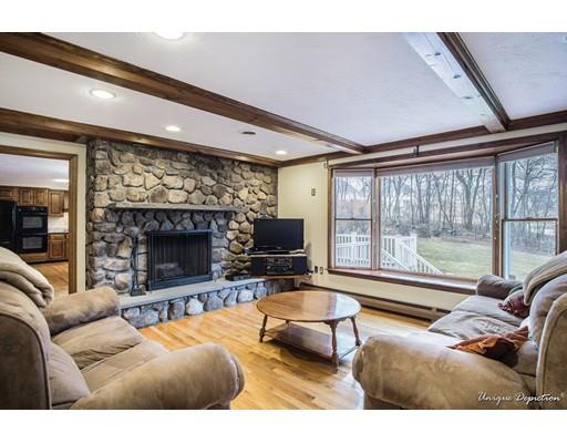 18 Argilla Road Methuen, MA 01844 - Photo 13 of 30 a living room with furniture and a fireplace