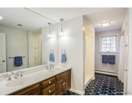 18 Argilla Road Methuen, MA 01844 - Photo 15 of 30 a bathroom with a sink a double vanity and a mirror