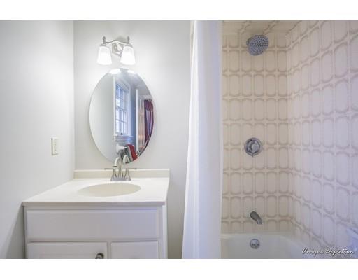 18 Argilla Road Methuen, MA 01844 - Photo 18 of 30 a bathroom with a sink mirror and shower