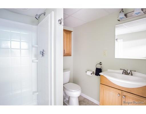 18 Argilla Road Methuen, MA 01844 - Photo 26 of 30 a bathroom with a sink a toilet and shower