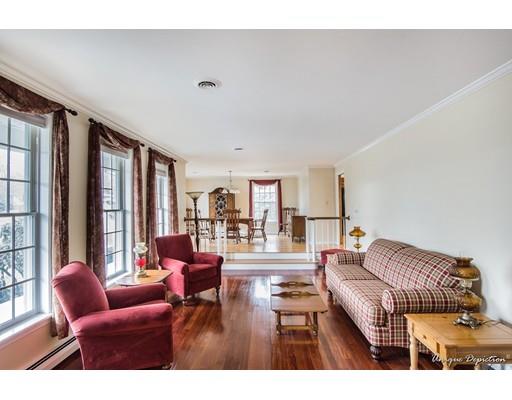 18 Argilla Road Methuen, MA 01844 - Photo 3 of 30 a living room with furniture and a large window