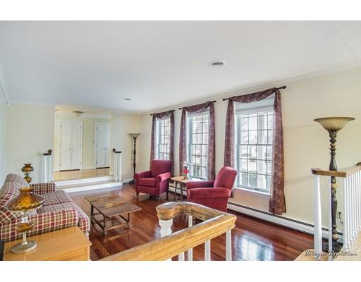 18 Argilla Road Methuen, MA 01844 - Photo 5 of 30 a living room with furniture and a floor to ceiling window