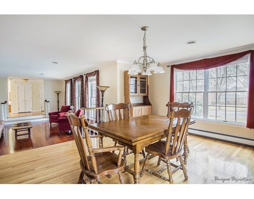 18 Argilla Road Methuen, MA 01844 - Photo 7 of 30 a view of a dining room with furniture window and wooden floor