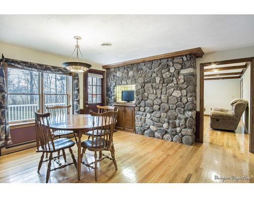 18 Argilla Road Methuen, MA 01844 - Photo 10 of 30 a view of a dining room with furniture and wooden floor