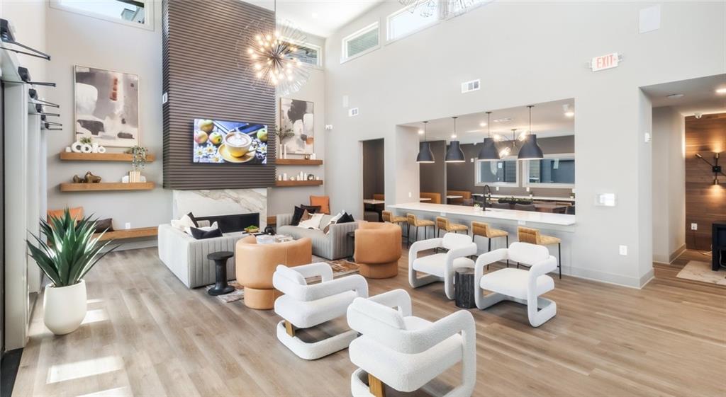 277 Clifton Street Southeast, Unit B1 Atlanta, GA 30317 - Photo 10 of 30 a living room with furniture and a flat screen tv