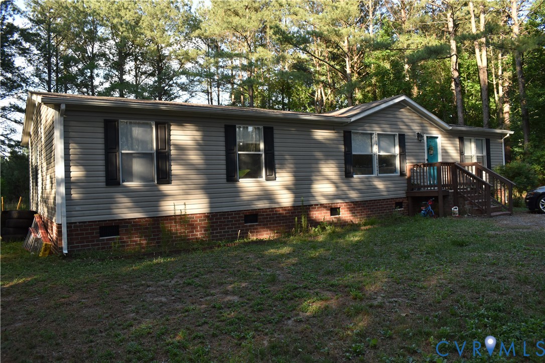 26049 Guy Place Road Courtland, VA 23837 - Photo 3 of 24 Single-story residence featuring light-colored sid