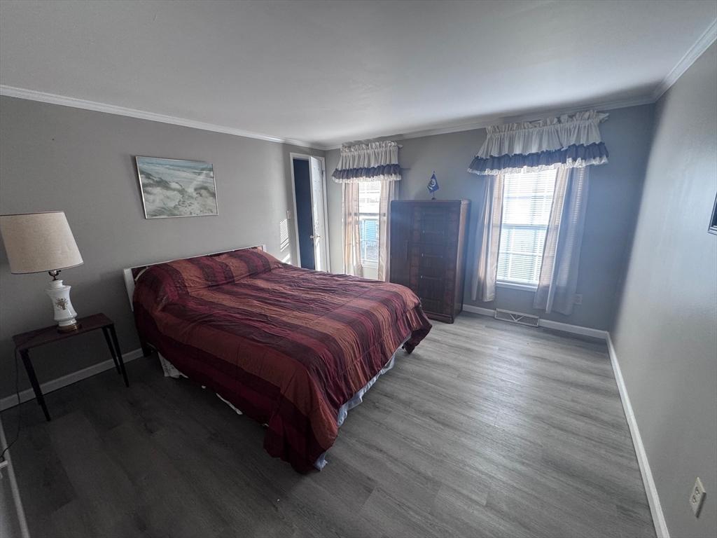 500 Mendon Road, Unit 257 Attleboro, MA 02703 - Photo 11 of 20 a spacious bedroom with a bed and window