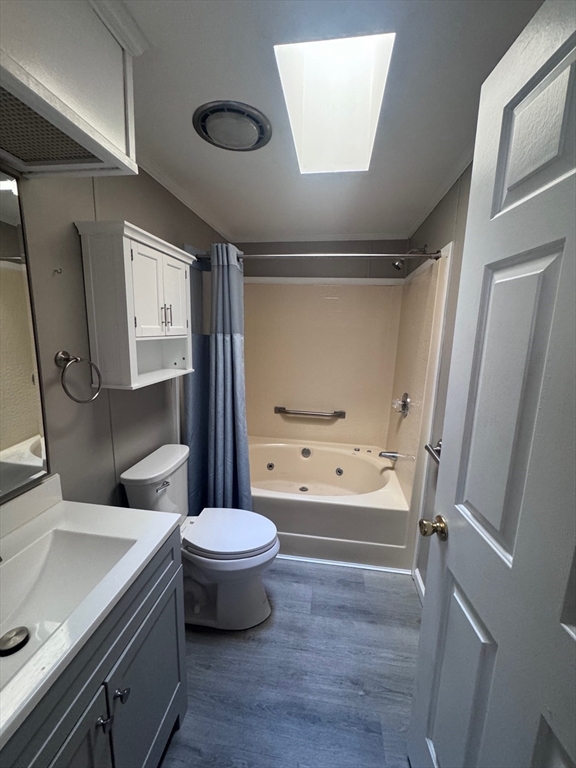 500 Mendon Road, Unit 257 Attleboro, MA 02703 - Photo 14 of 20 a bathroom with a sink a toilet and a bathtub