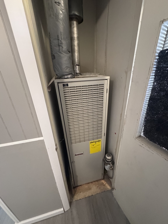 500 Mendon Road, Unit 257 Attleboro, MA 02703 - Photo 16 of 20 a view of an empty room with wooden floor and a window