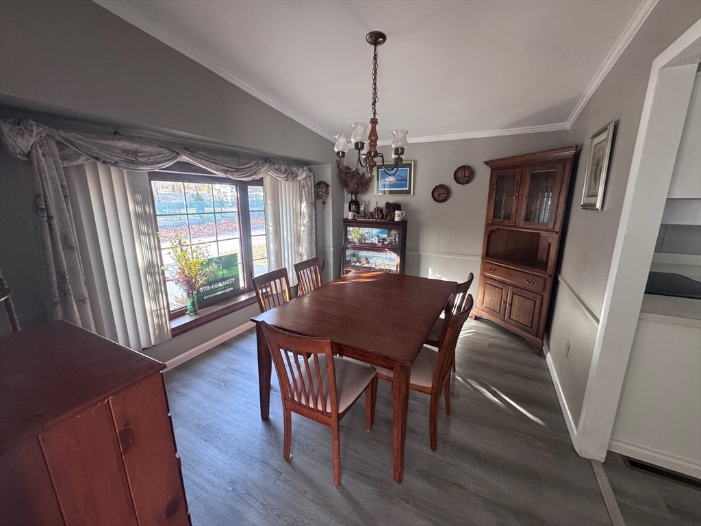 500 Mendon Road, Unit 257 Attleboro, MA 02703 - Photo 5 of 20 a view of a dining room with furniture window and wooden floor
