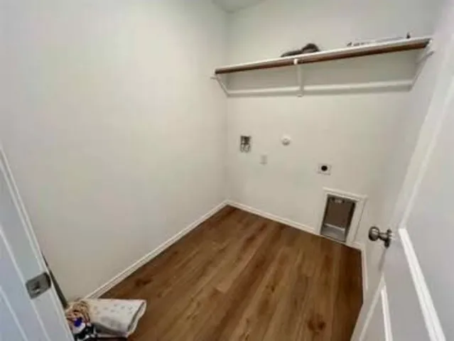 a view of small space with empty racks on the wall