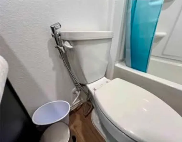 a utility room with shower