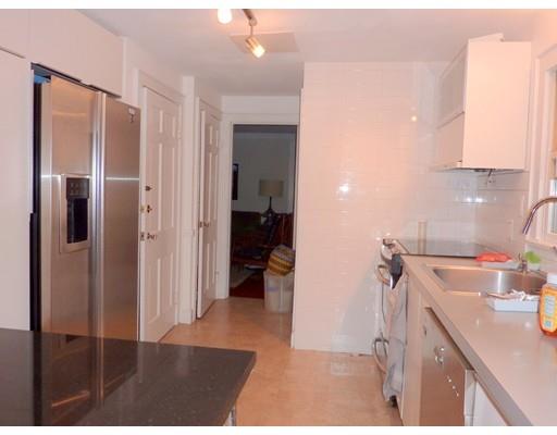 17 Taylor Road Belmont, MA 02478 - Photo 4 of 12 a view of a kitchen from the hallway