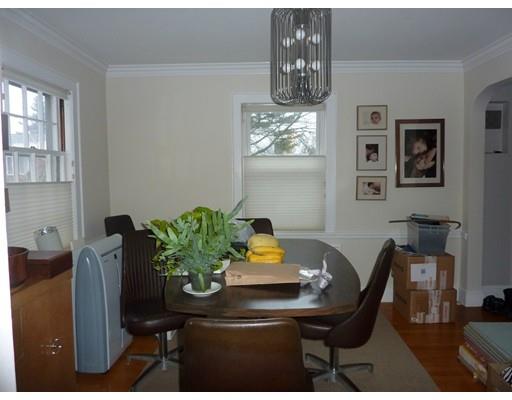 17 Taylor Road Belmont, MA 02478 - Photo 7 of 12 a view of a dining room with furniture and chandelier