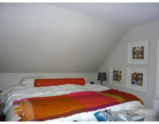 17 Taylor Road Belmont, MA 02478 - Photo 9 of 12 a bedroom with a bed and painting on the wall