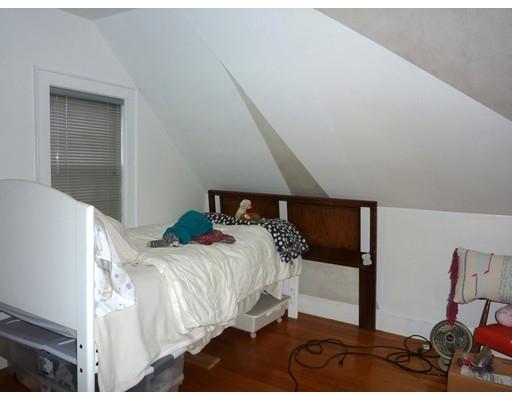 17 Taylor Road Belmont, MA 02478 - Photo 10 of 12 a bedroom with a bed and wooden floor
