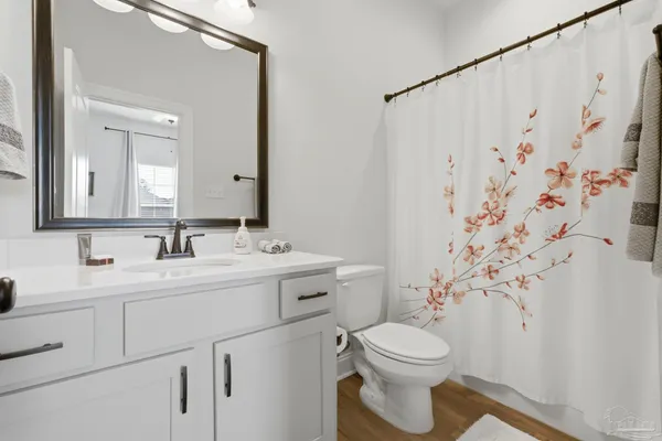 a bathroom with a sink and a toilet