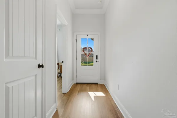 a view of entryway with wooden floor