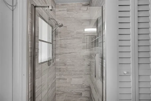 a kitchen with stainless steel appliances a stove a sink and a refrigerator