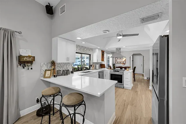 a room with furniture and a fireplace