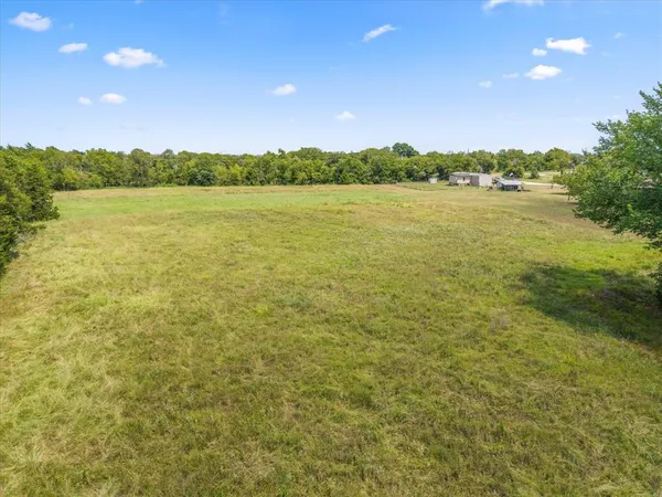 a view of an outdoor space and a yard