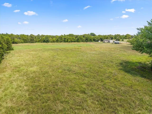 a view of an outdoor space and a yard