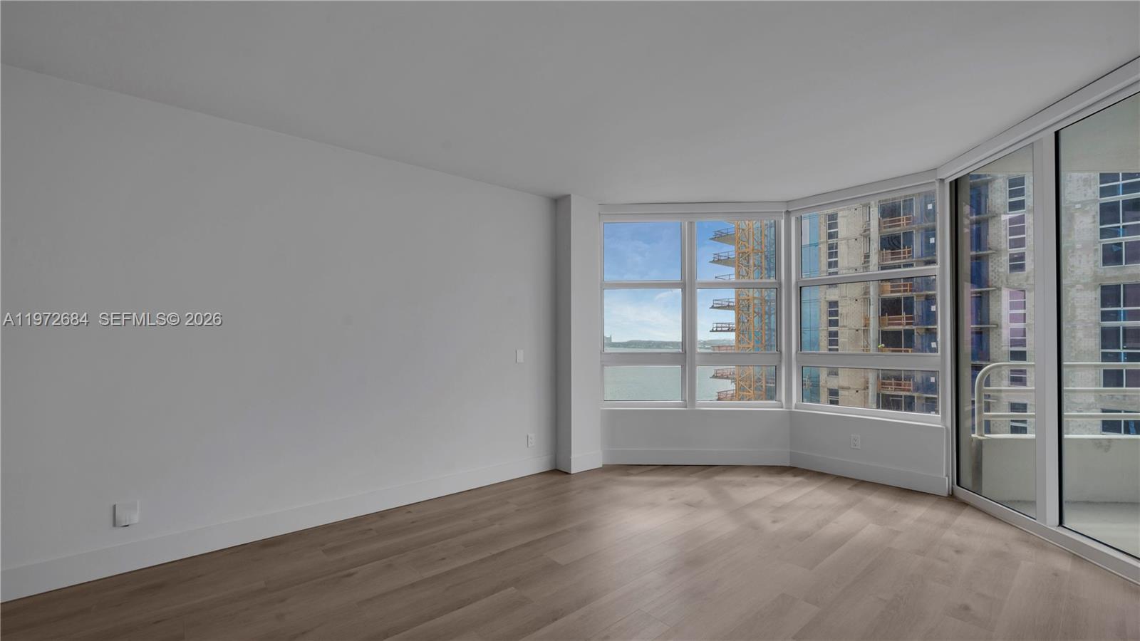 555 Northeast 34th Street, Unit 2607 Miami, FL 33137 - Photo 18 of 35 an empty room with windows