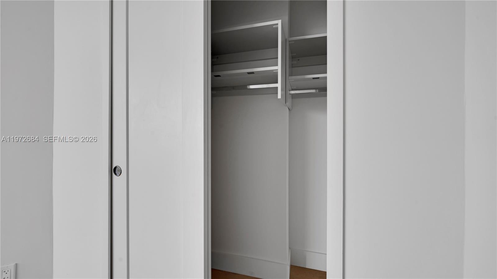 555 Northeast 34th Street, Unit 2607 Miami, FL 33137 - Photo 31 of 35 a view of an empty walk in closet