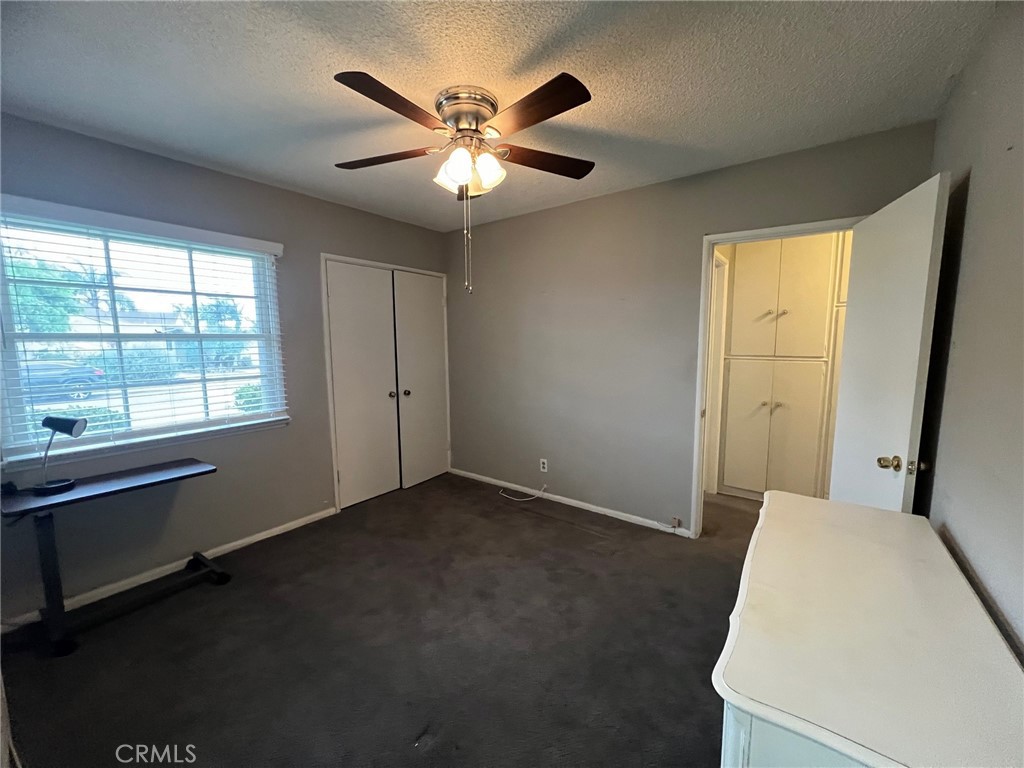 223 Albert Avenue Pomona, CA 91767 - Photo 13 of 18 wooden floor in an empty room with a window