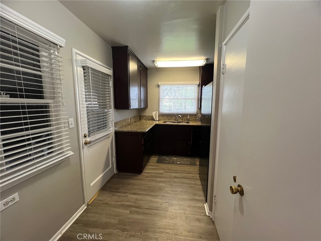 223 Albert Avenue Pomona, CA 91767 - Photo 4 of 18 a bathroom with a sink and a mirror