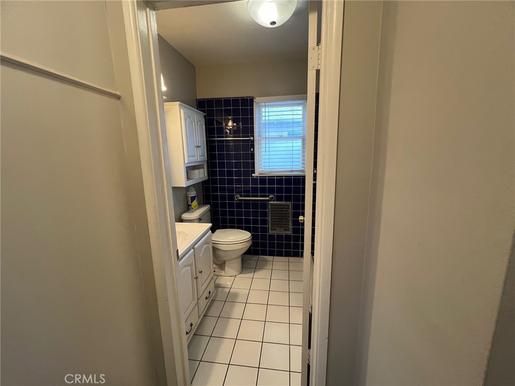 223 Albert Avenue Pomona, CA 91767 - Photo 6 of 18 a view of bathroom with a toilet