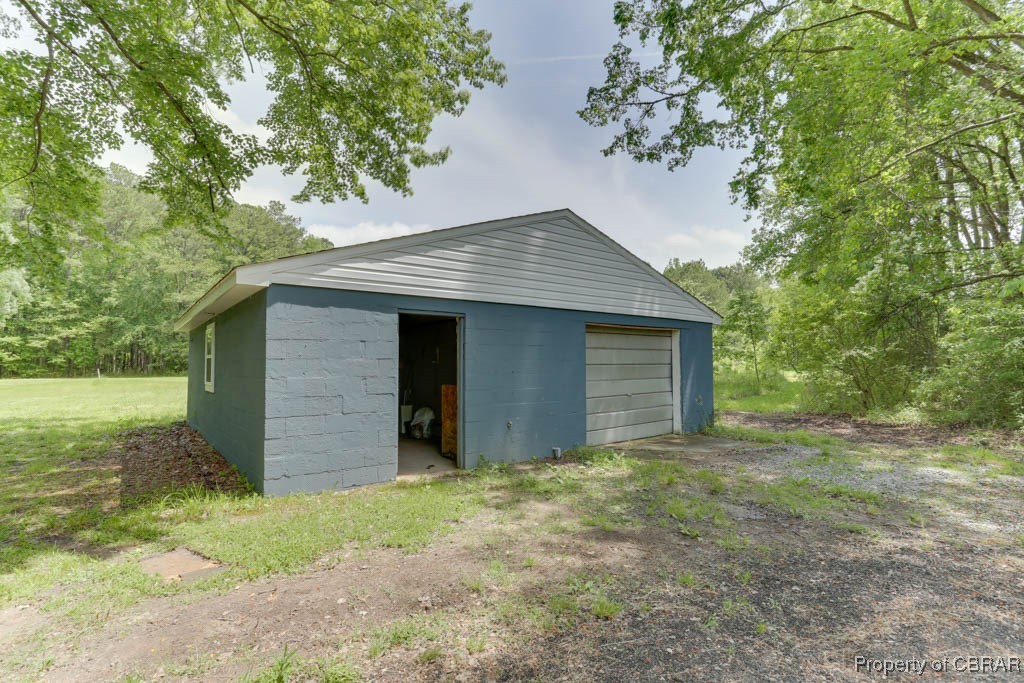 917 Chapel Neck Road North, VA 23128 - Photo 23 of 29 View of outbuilding featuring an outdoor structure