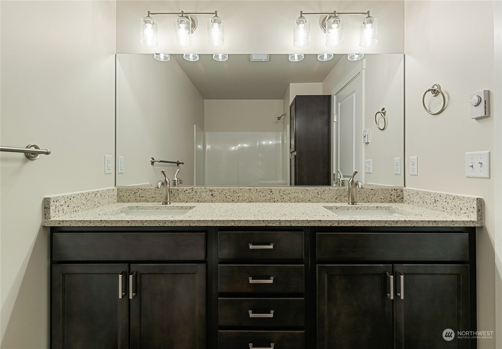 1613 Sunup Loop Bellingham, WA 98226 - Photo 9 of 13 a bathroom with double sink and a mirror