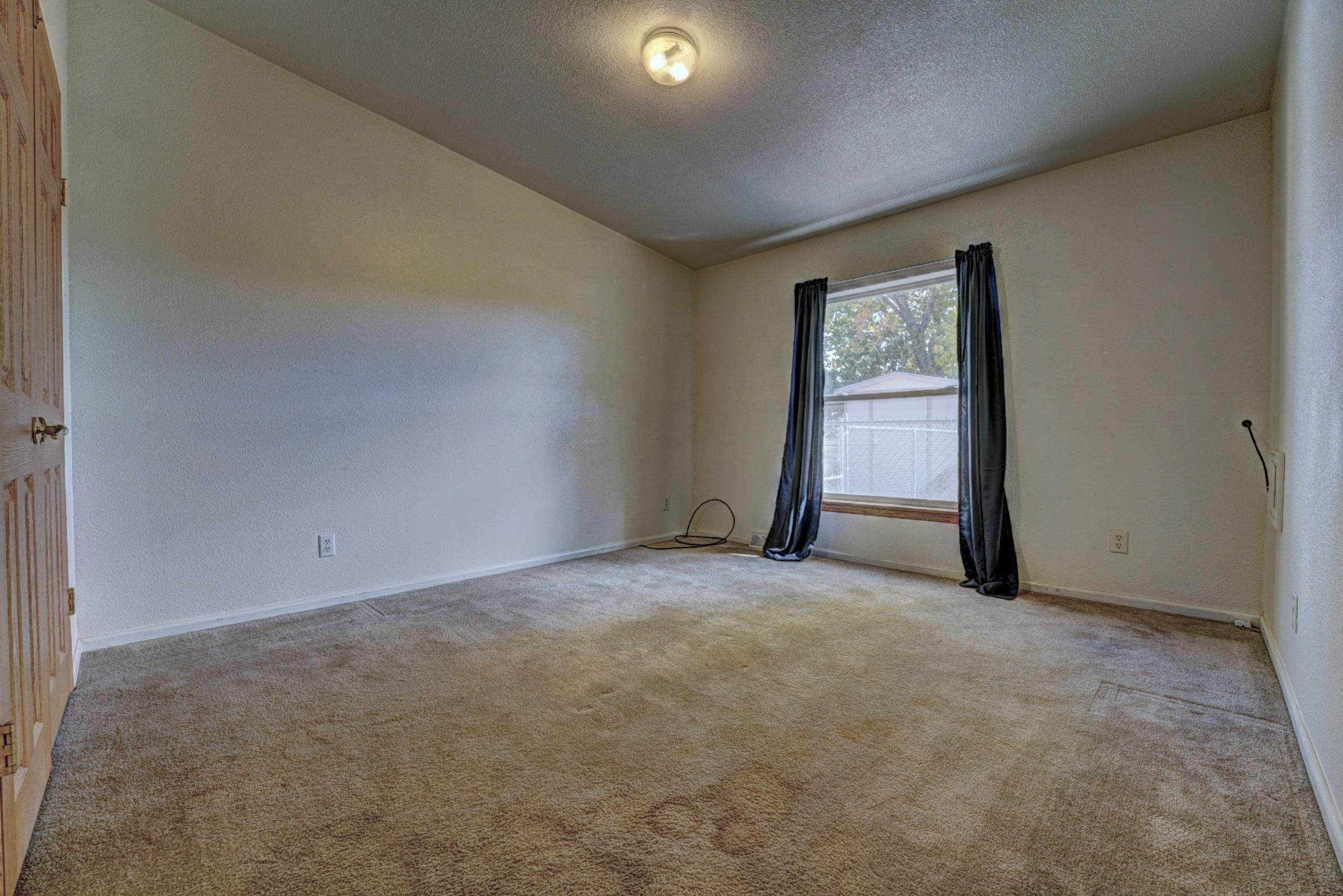 694-29 29 1/2 Road Grand Junction, CO 81504 - Photo 18 of 27 a view of an empty room and window