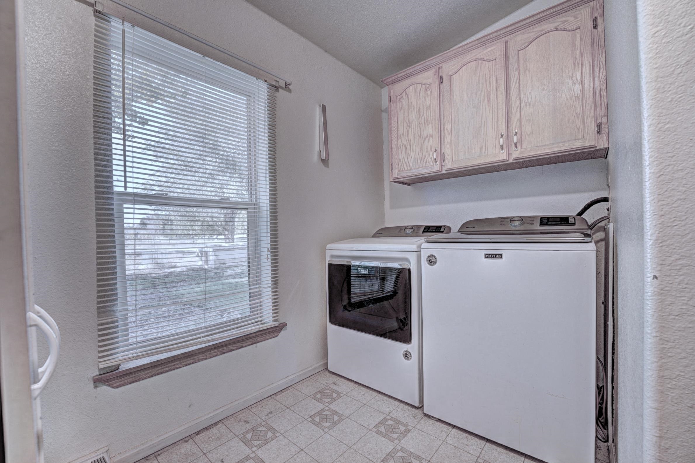694-29 29 1/2 Road Grand Junction, CO 81504 - Photo 20 of 27 a utility room with dryer and washer